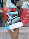 کتونی بسکتبال ساق دار دخترانه کاستوم نایک ایر جردن ۱ مشکی آبی Nike Air Jordan