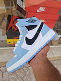 کتونی بسکتبال دخترانه ساق دار نایک ایر جردن ۱ آبی آسمانی (Nike Air Jordan 1 University Blue)