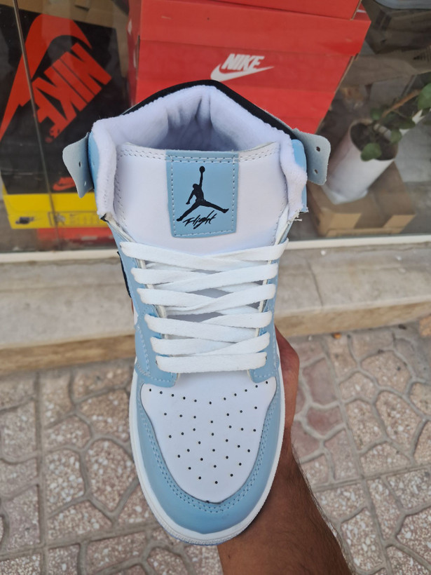 کتونی بسکتبال دخترانه ساق دار نایک ایر جردن ۱ آبی آسمانی (Nike Air Jordan 1 University Blue)