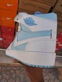 کتونی بسکتبال مردانه ساق دار نایک ایر جردن ۱ سفید آبی (Nike Air Jordan 1 University Blue